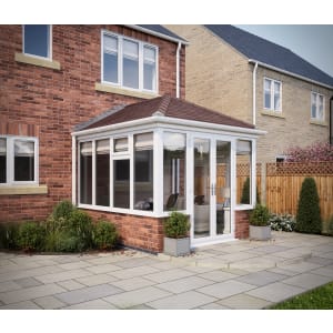 SOLid roof Edwardian Conservatory White Frames Dwarf Wall with Rustic Brown Tiles