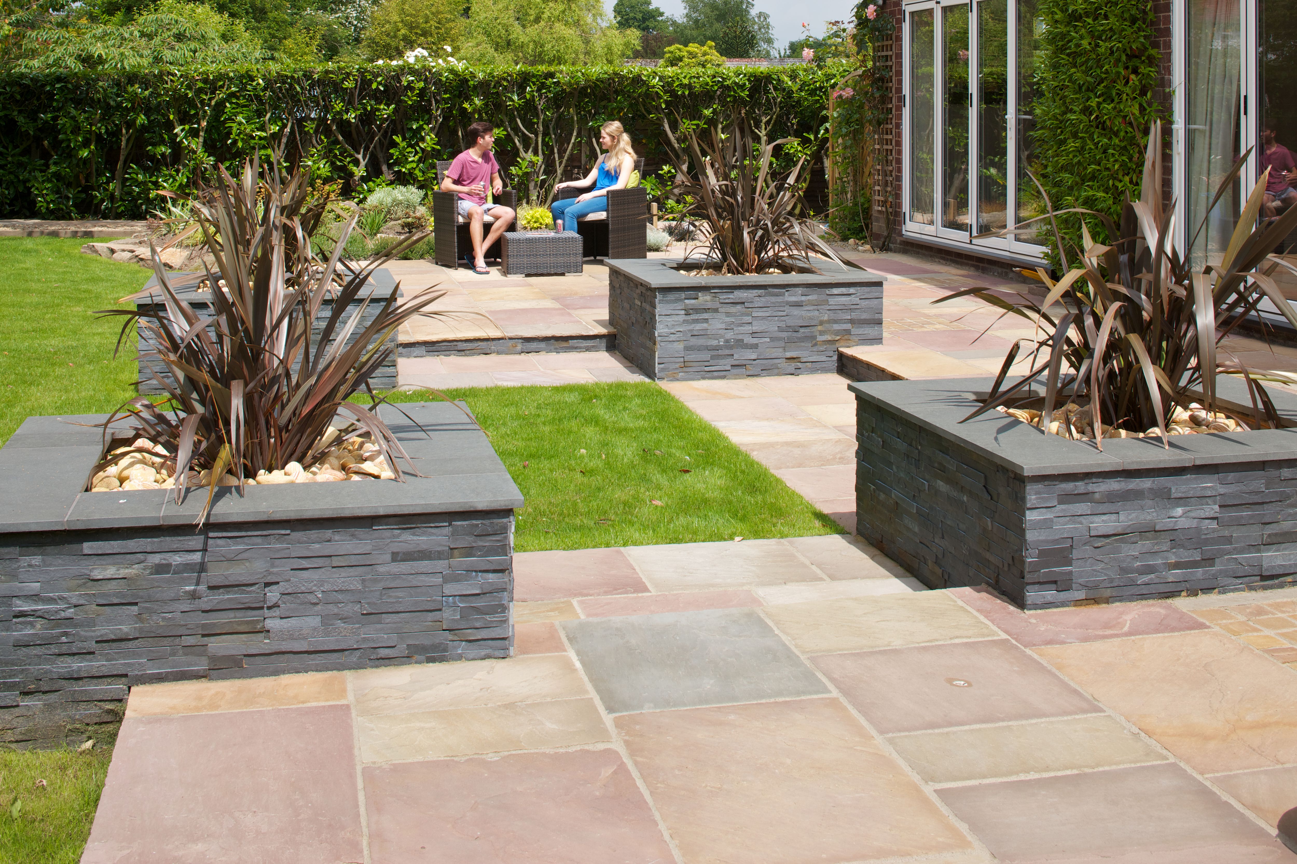 Image of Marshalls Indian Sandstone Textured Brown Multi Paving Slab 845 x 560 x 15-25mm - Pack of 37