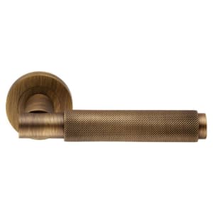 Varese Knurled Lever on Concealed Fix Round Rose Door Handle - Antique Brass